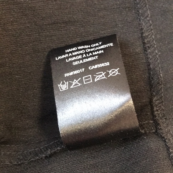 Bebe mechanical fabric peplum dress. - Picture 11 of 11